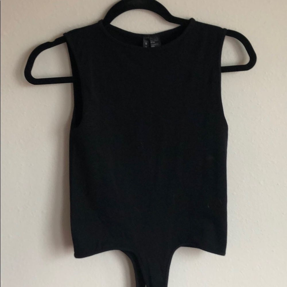 High neck body suit.